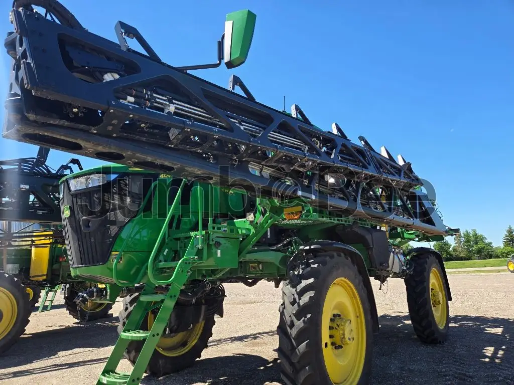 2025 John Deere 412R - Used, 536 Hours for Sale — photo 1 of 9
