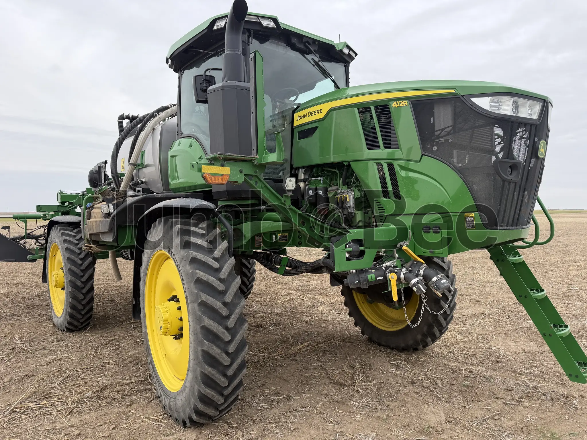 John Deere 412R 2025 - Usado (317 Horas) en Venta — foto 1 de 36