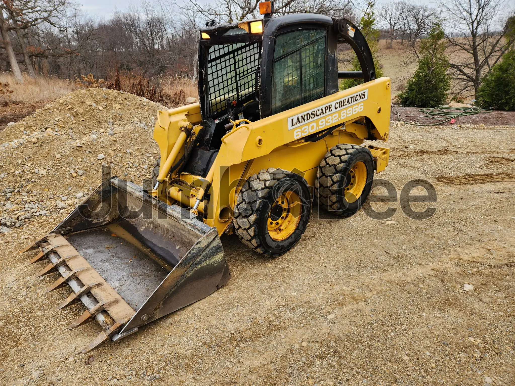2003 John Deere 240-II - Used, 3,672 Hours for Sale — photo 1 of 2