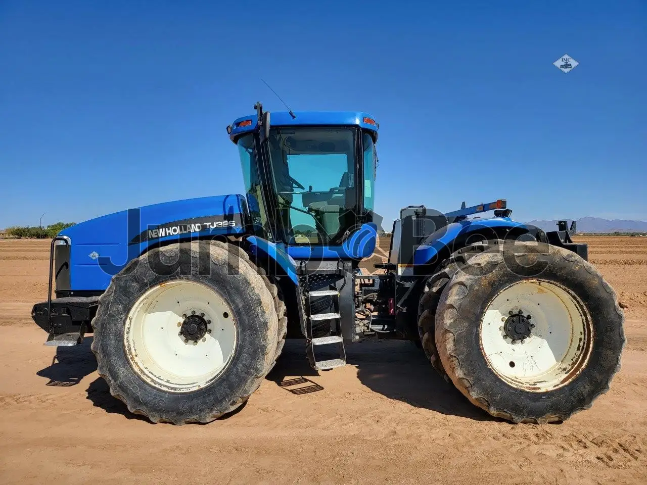 New Holland TJ325 2003 - Usado en Venta — foto 1 de 22