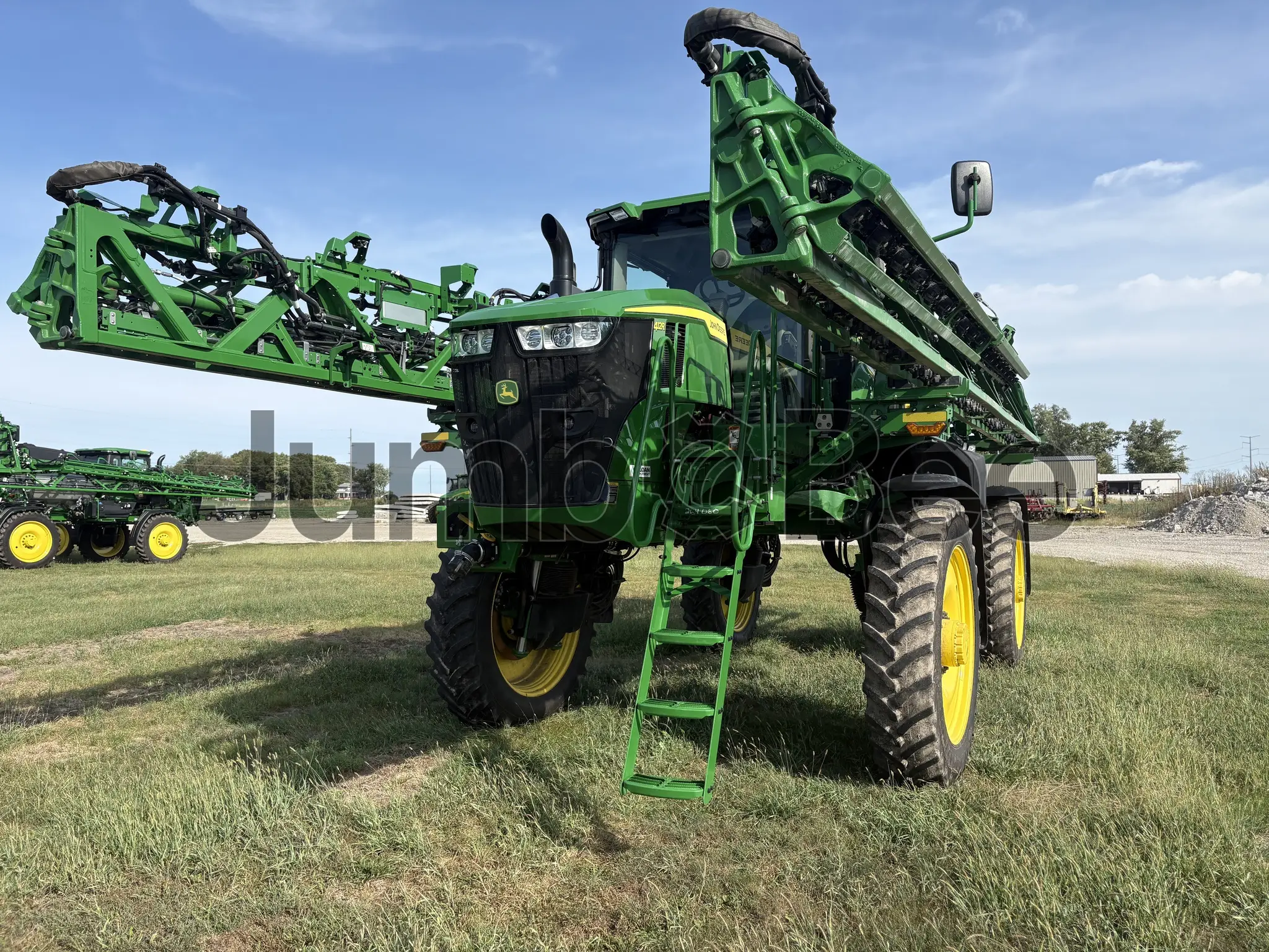 2026 John Deere 412R - Used, 484 Hours for Sale — photo 1 of 38