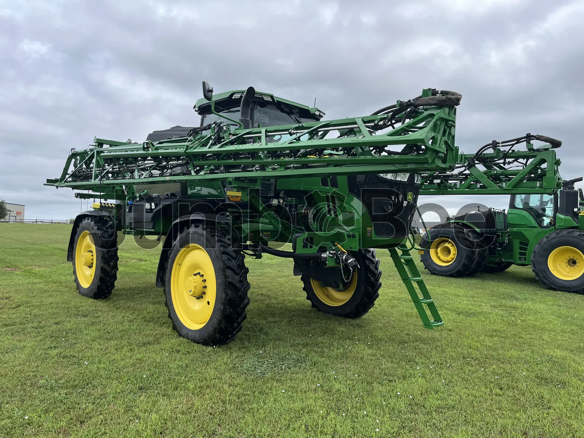 2025 John Deere 412R - Used, 531 Hours for Sale — photo 1 of 39