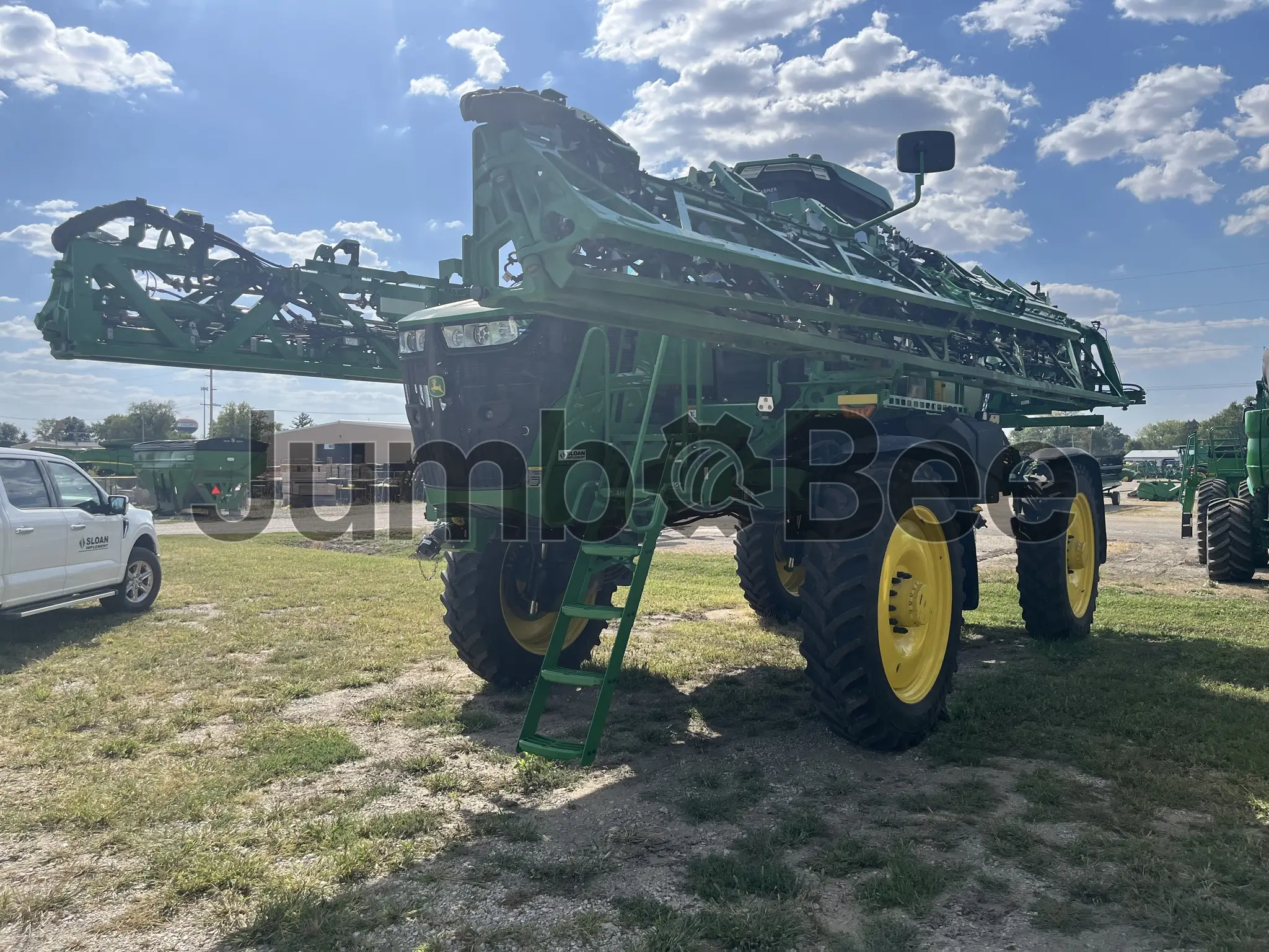 John Deere 412R 2025 - Usado (739 Horas) en Venta — foto 1 de 17