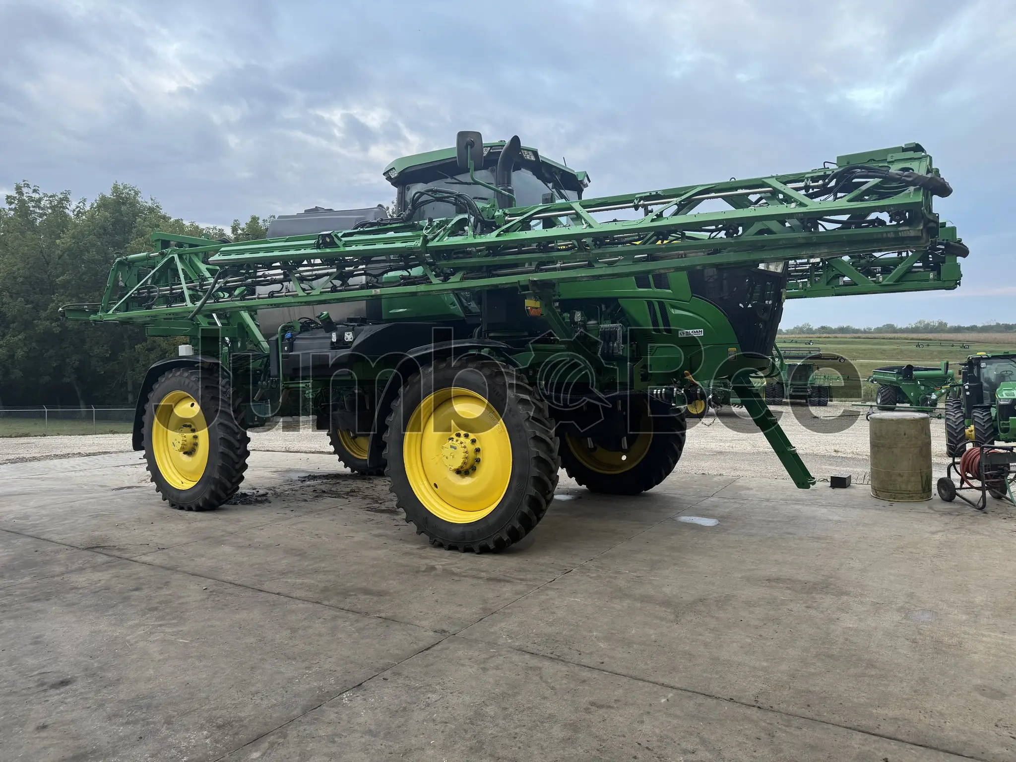 John Deere 412R 2023 - Usado (1,079 Horas) en Venta — foto 1 de 20